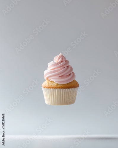 Playful Flying Cupcake with Swirling Frosting.
