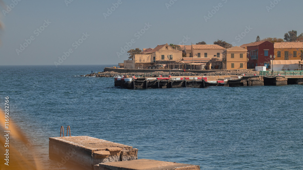Port of isle de goree, a former slave port on the named island, just outside of Dakar in Senegal. Visible sea, bay and port, now a tourist spot.