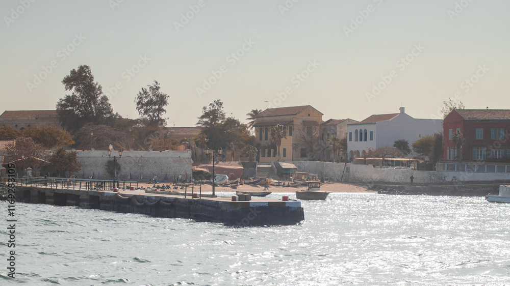 Port of isle de goree, a former slave port on the named island, just outside of Dakar in Senegal. Visible sea, bay and port, now a tourist spot.