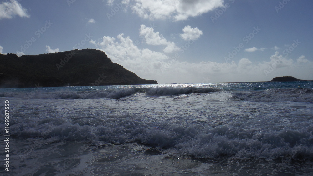 Beautiful sea and beach during a beautiful day in the Frech West Indies, more specifically in Saint-Barthélémy, French territory in the Caribbeans. Beautiful sea and beach during a beautiful day in the Frech West Indies, more specifically in Saint-Barthélémy, French territory in the Caribbeans.
