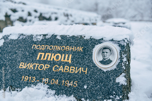 Canvas Print Slavin Second Word War  memorial monument and military cemetery in snowy, foggy