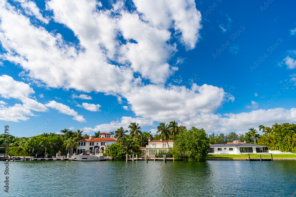 Fototapeta premium Residential architecture. Modern building. Residential apartment in waterfront city. Waterfront landscape house. Vacation building in summer. Luxury waterfront house. Hotel building. Luxury lifestyle