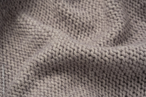 Grey wool sweater texture as a background. photo