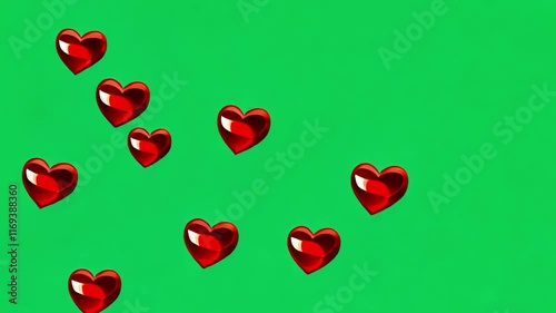 Red hearts floating on green screen background. 4K Social media Live style animated heart on green screen. Isolated Social media love like icon isolated on green chroma key screen. Heart  4k