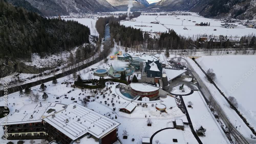 Langenfeld, Austria - December 12, 2024: Beautiful Aqua Dome thermal pools in the Austrian Alps - Tirol Therme in the vicinity of Stuibenfall Waterfall Langenfeld, Austria - December 12, 2024: Beautiful Aqua Dome thermal pools in the Austrian Alps - Tirol Therme in the vicinity of Stuibenfall Waterfall