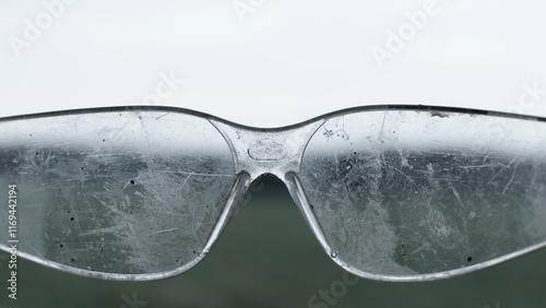 View through dirty plastic glasses