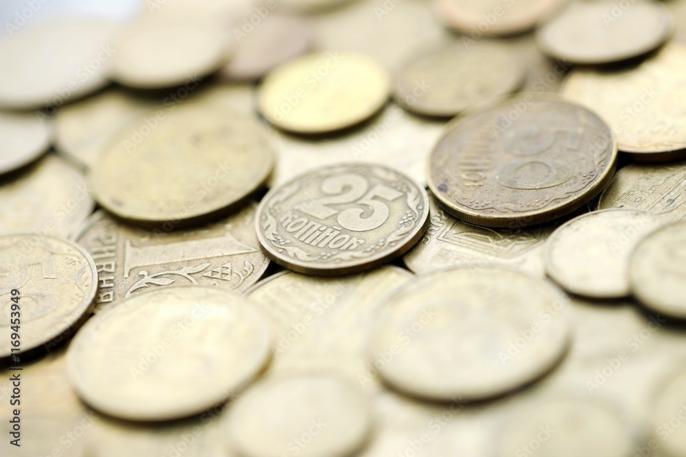 Big pile of different coins from various time period in Ukraine. Shiny Ukrainian money background Big pile of different coins from various time period in Ukraine. Shiny Ukrainian money background