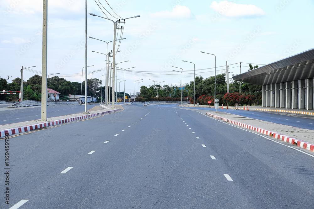 Empty road in CBD around transportation hub in Thailand. Empty road in CBD around transportation hub in Thailand.
