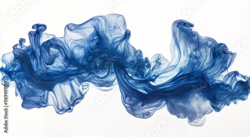 Blue ink swirling in water creating abstract shapes and patterns