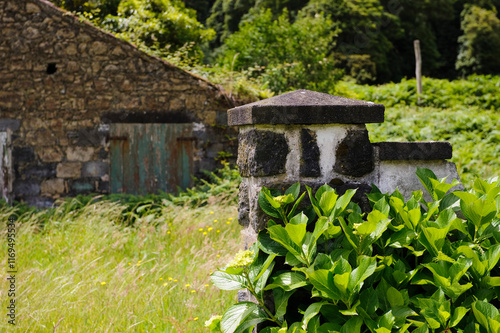 abandoned field and buildings photo