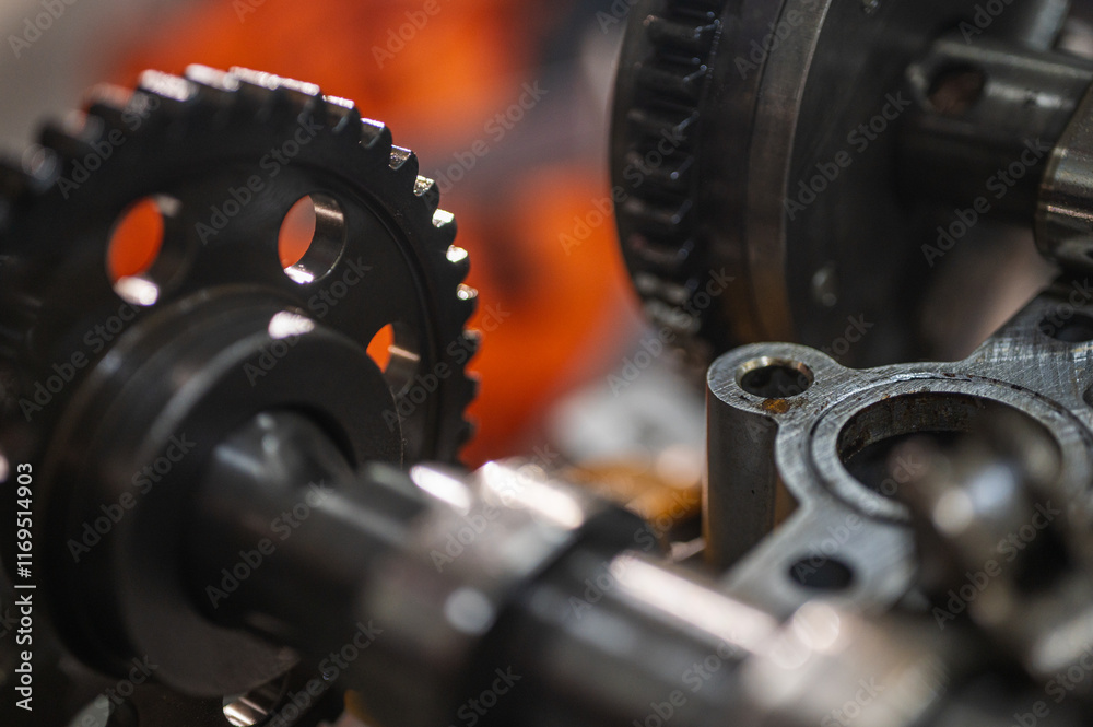 close-up of metal gears and mechanical parts symbolizing industrial equipment, precision engineering and mechanical processes, selective focus close-up of metal gears and mechanical parts symbolizing industrial equipment, precision engineering and mechanical processes, selective focus