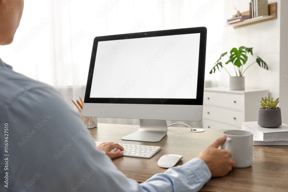 Woman working with computer monitor at wooden table in office, closeup. Mockup for design Woman working with computer monitor at wooden table in office, closeup. Mockup for design