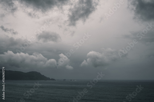 Some low clouds near Cabo Ortegal on a leaden rainy day photo