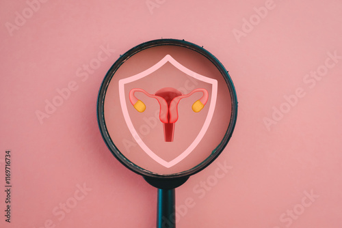 Women's Health, Female Reproductive System,PCOS,gynecologic concept.,Guard with uterus under magnifying glass idea for wellness, prevention, and medical care emphasizing reproductive health.
