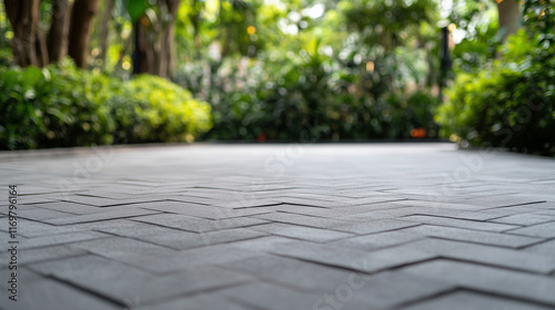 Wallpaper Mural Smooth concrete pavers arranged in a herringbone pattern, displayed outdoors in a landscaped garden setting. Torontodigital.ca