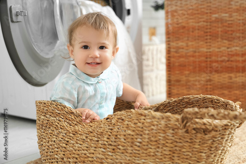 Cute little baby sitting in...