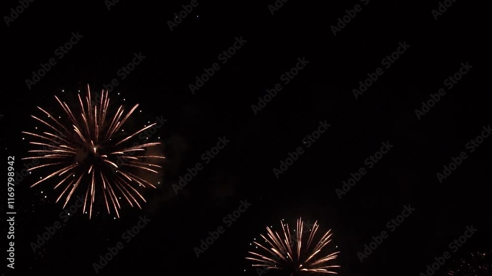 Real Shining Fireworks Display New year's Celebration in Night Sky. Slow motion. Real Shining Fireworks Display New year's Celebration in Night Sky. Slow motion.