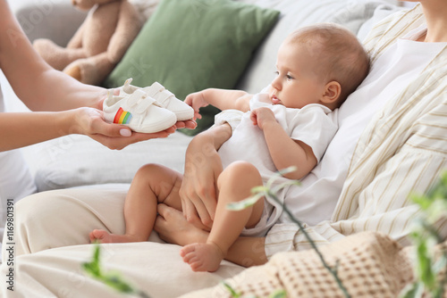 Young lesbian couple with t...