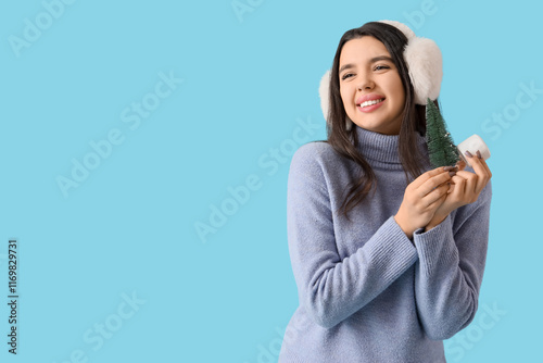 Young woman in winter cloth...
