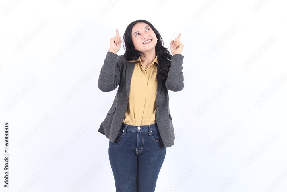 young Asian business woman in blazer pointing finger up young Asian business woman in blazer pointing finger up