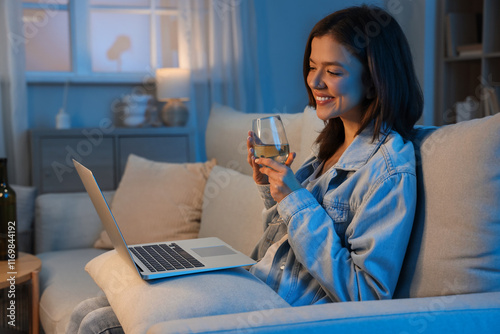 Young woman with wine havin...