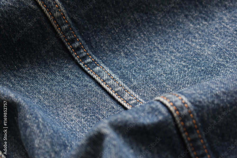 Fototapeta premium seam of blue denim texture background, jean fashion style