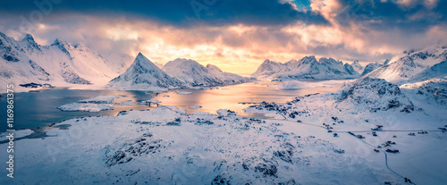 Panoramic winter view of Norway. Fantastic morning scene of Lofoten Islands  with Fredvang bridge and Volandstind peak on background. Great seascape of Norwegian sea. Traveling concept background. photo