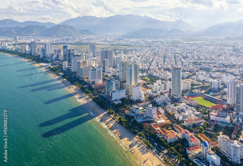 The coastal city of Nha Trang seen from above in the affternoon, beautiful coastline. This is a city that attracts to relax in central Vietnam
 photo