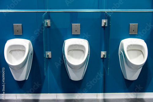 Public Urinals in International Airport photo