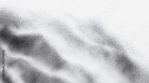 Blurry image of a sandy beach with a few dark specks. Scene is somewhat mysterious and hazy, as the sand appears to be covered in a fine layer of dust photo