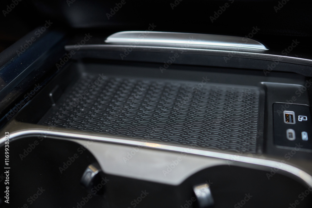 Close-up of wireless charging inside a car Close-up of wireless charging inside a car