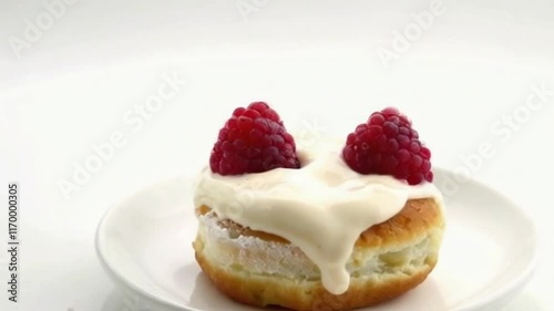 Wallpaper Mural Vanilla raspberry cronut on a pedestal with white glaze and berries, spotlighting soft glow and red accents for a luxurious inviting scene Torontodigital.ca