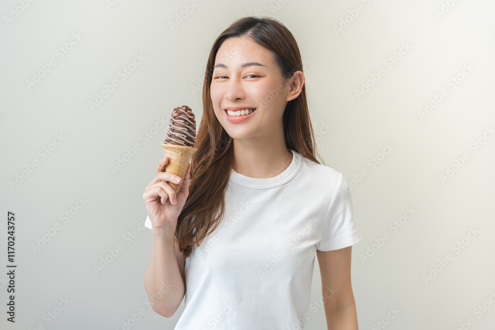 Cheerful enjoy, portrait of happy asian woman have fun with brunette hair, holding ice cream waffle cone chocolate cream tasty, enjoy girl hold delicious frozen dessert, sweet in summer hot weather. Cheerful enjoy, portrait of happy asian woman have fun with brunette hair, holding ice cream waffle cone chocolate cream tasty, enjoy girl hold delicious frozen dessert, sweet in summer hot weather.