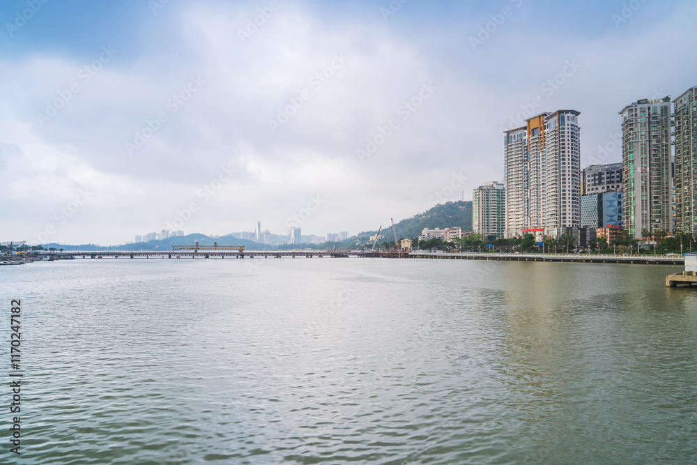 Modern urban architecture skyline and coastal scenery in Zhuhai, Guangdong Province, China on April 9, 2023 Modern urban architecture skyline and coastal scenery in Zhuhai, Guangdong Province, China on April 9, 2023
