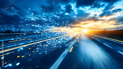 Dynamic motion of light streaks on a highway at sunset