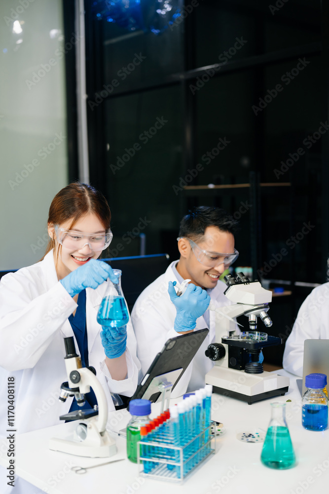 Fototapeta premium Dynamic science lab where a team of scientists collaborates on research, testing, and innovation