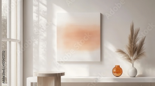 Abstract white canvas with delicate orange hues and minimalist decor in a bright room setting photo