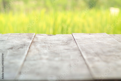 Empty top of wooden table and view of sunset or sunrise background photo