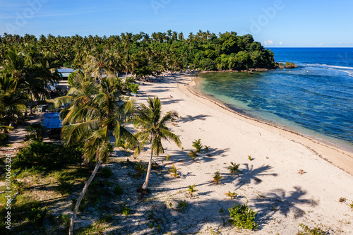 Tropical beach with palm trees, aerial view, Siargao island, Philippines photo