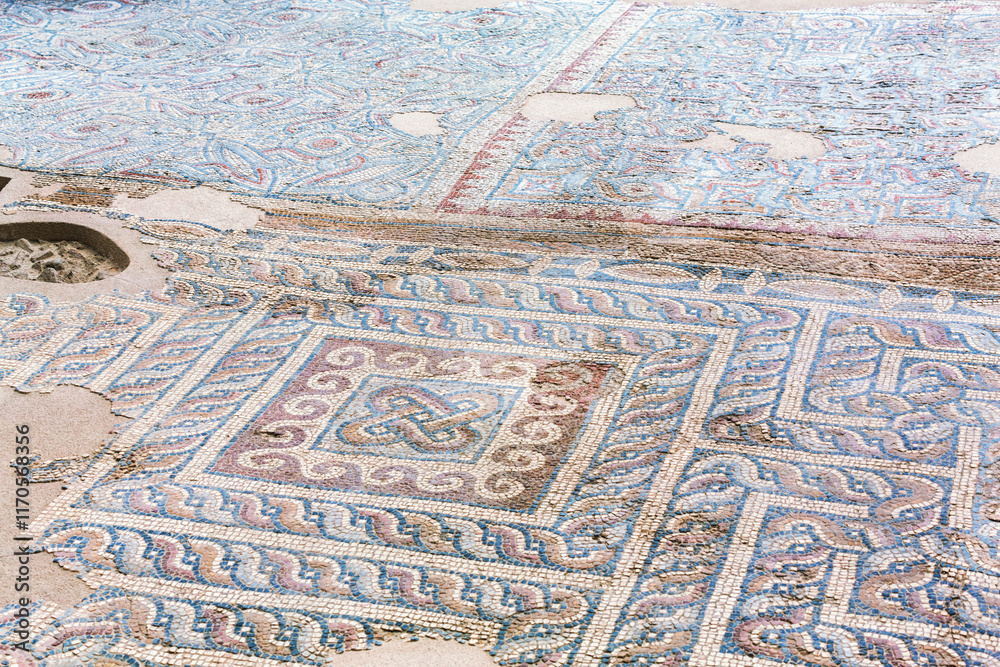 Ancient floor mosaic from the Church of the Apocalypse in Laodicea, colorful geometric patterns. Denizli, Turkey (Turliye) Ancient floor mosaic from the Church of the Apocalypse in Laodicea, colorful geometric patterns. Denizli, Turkey (Turliye)