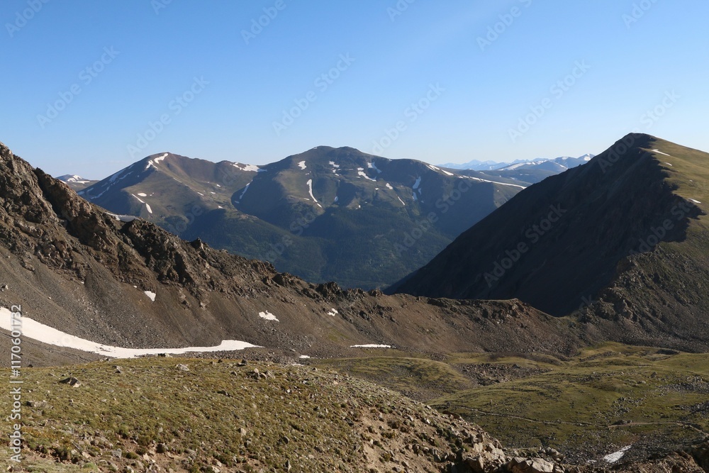 Fototapeta premium Scenic Rocky Mountain view with snow patches.