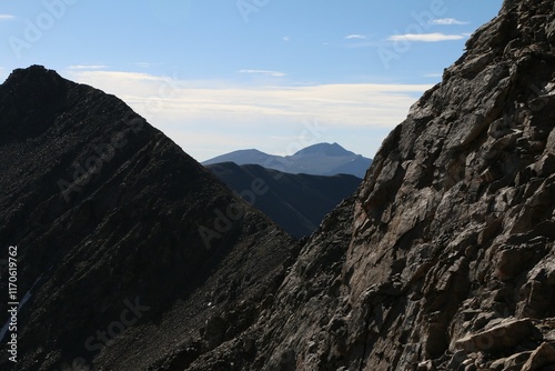 Rugged mountain peaks under a clear sky