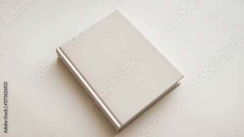 High Angle Shot of Blank White Book Cover - Minimalist Design Concept