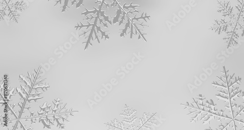 Beautiful winter white snowflakes background with copy space.