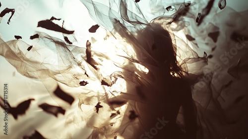 Ethereal Silhouette of a Woman Surrounded by Flowing Fabric and Leaves in Dreamlike Atmosphere
