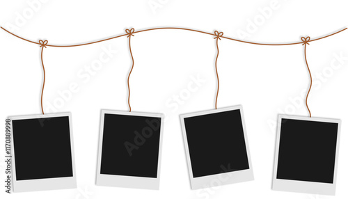 blank polaroid photo frames hanging from string