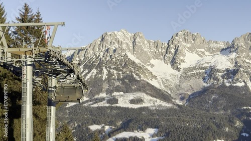 Ski lift at Astbergsee in Tyrol with the Wilder Kaiser in the background 4k photo