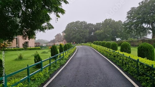 Pathway to Historic Monument in India, Surrounded by Garden and Trees photo