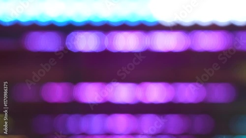 Colorful moving lights amusement park blurred background backdrop
