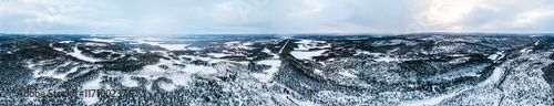 huge 360 degrees lapland winter aerial Inari Nellim frozen lakes and forest landscape panorama photo